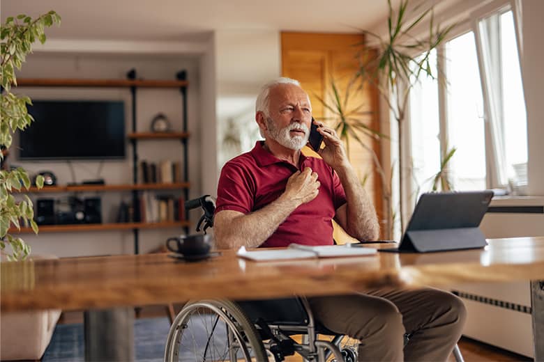 older man on call looking for a social security disability lawyer