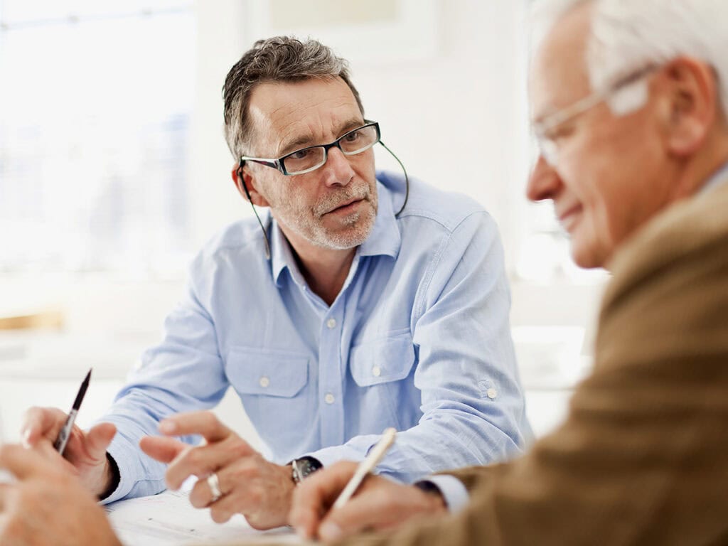 Man in important discussion with senior