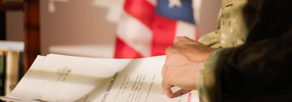 Military man reviewing important documents